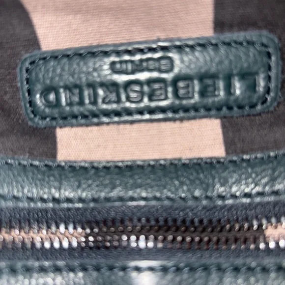 Liebeskind python-embossed leather crossbody bag.